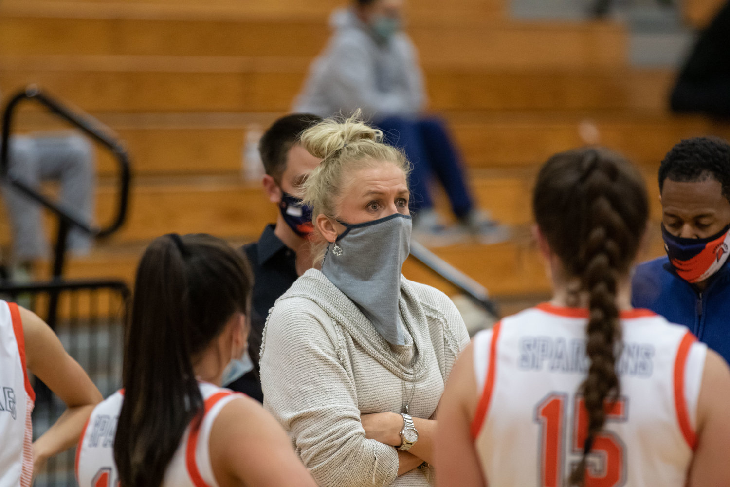 Seven Lakes coach Angela Spurlock talks to her players during a timeout during a game against George Ranch on Dec. 14 at Seven Lakes High.